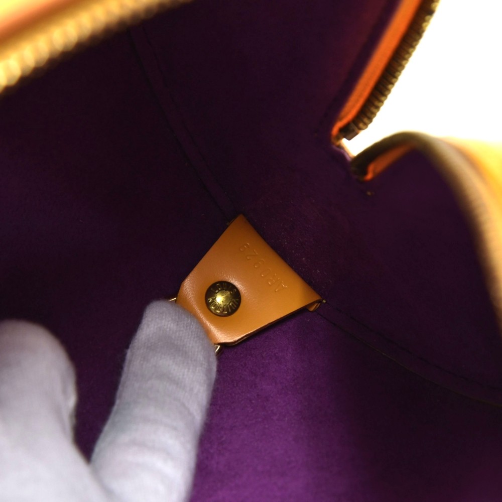 Louis Vuitton - Louis Vuitton old yellow leather suction button