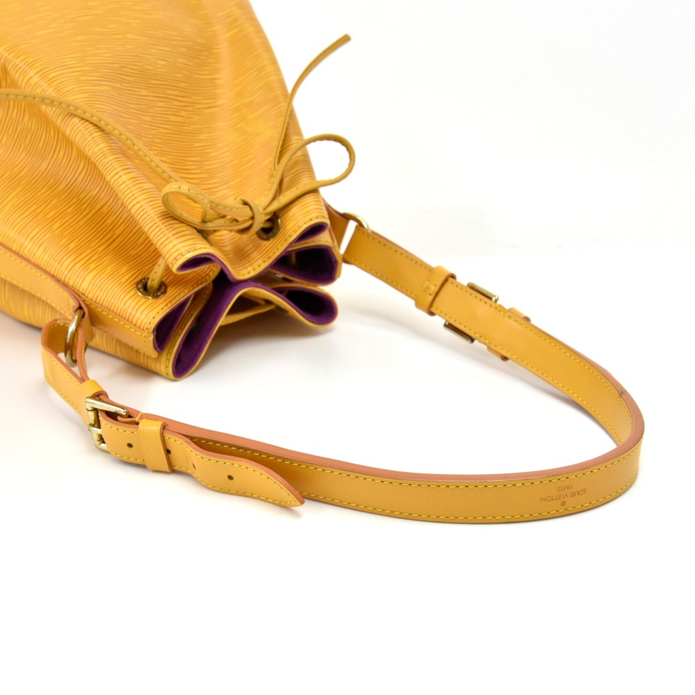 Louis Vuitton Noe Yellow PM Epi Leather Shoulder Bag, with yellow stitching  and brass hardware, opening to a purple suede interior w sold at auction  on 5th December