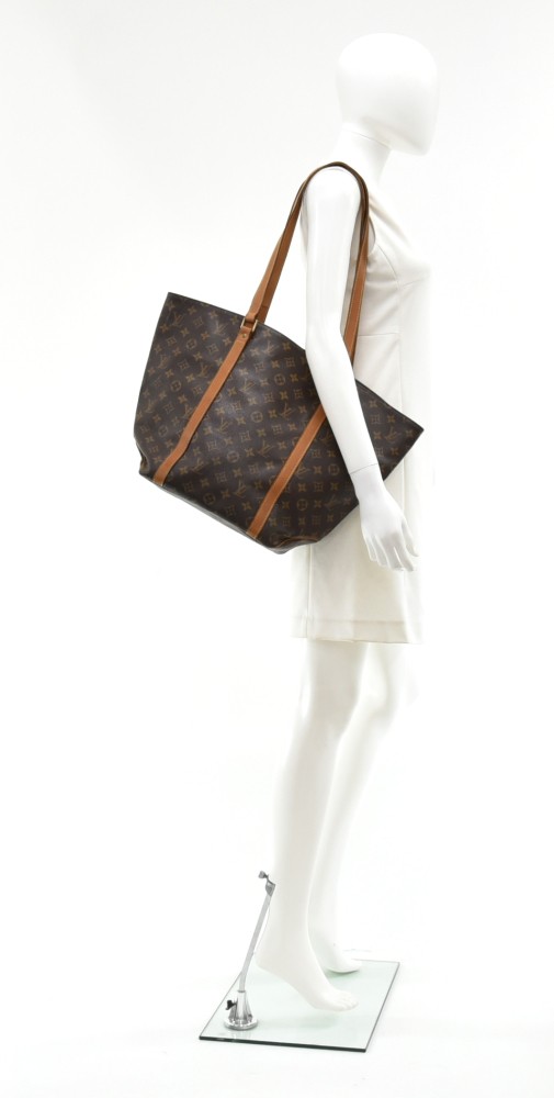 Louis Vuitton Vintage Classic Shopper Tote, $899, farfetch.com