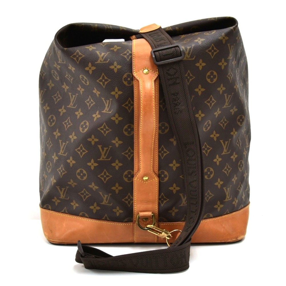 Lot - A Louis Vuitton leather and monogram canvas Sac Marin duffle, late  20th century