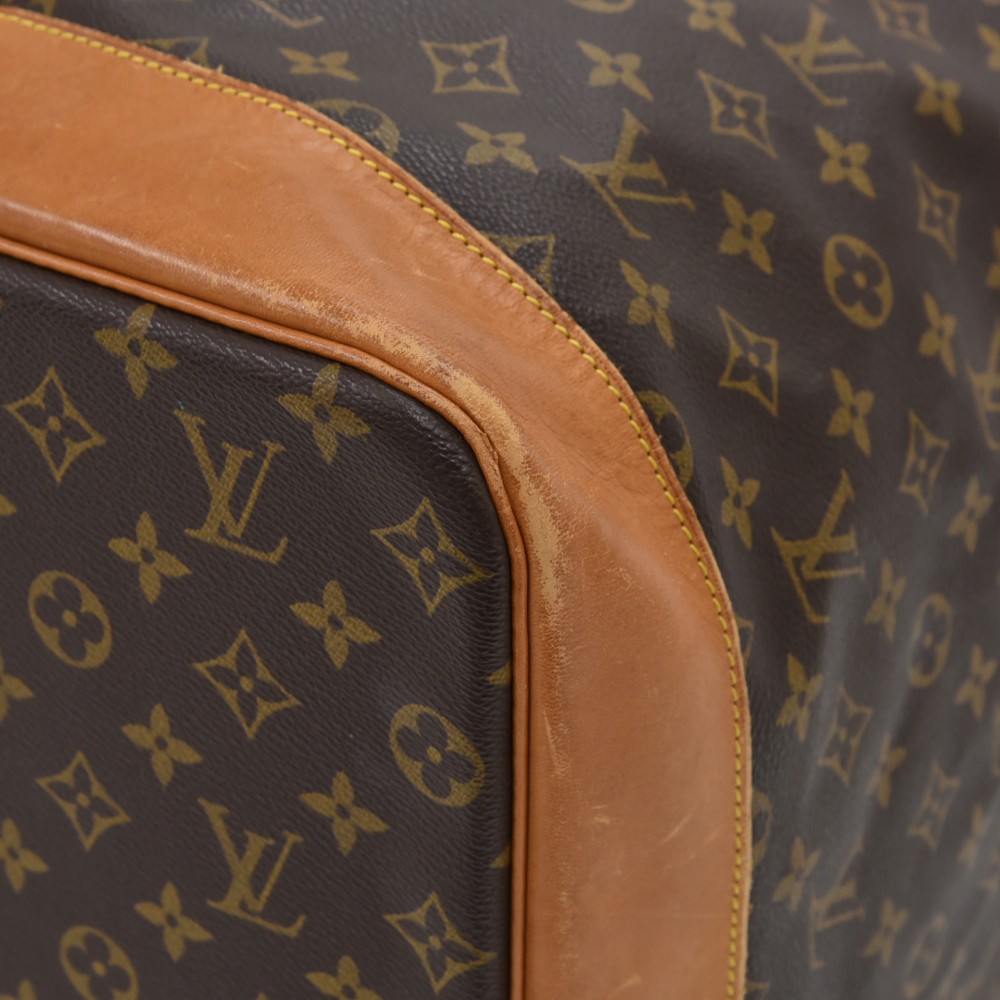 Lot - A Louis Vuitton leather and monogram canvas Sac Marin duffle