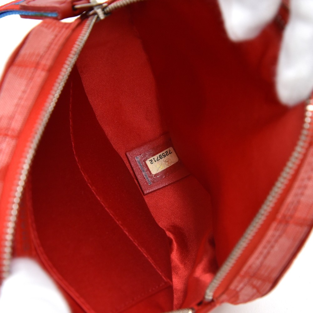 Chanel Chanel Travel Line Red Jacquard Nylon Round Wristlet Bag