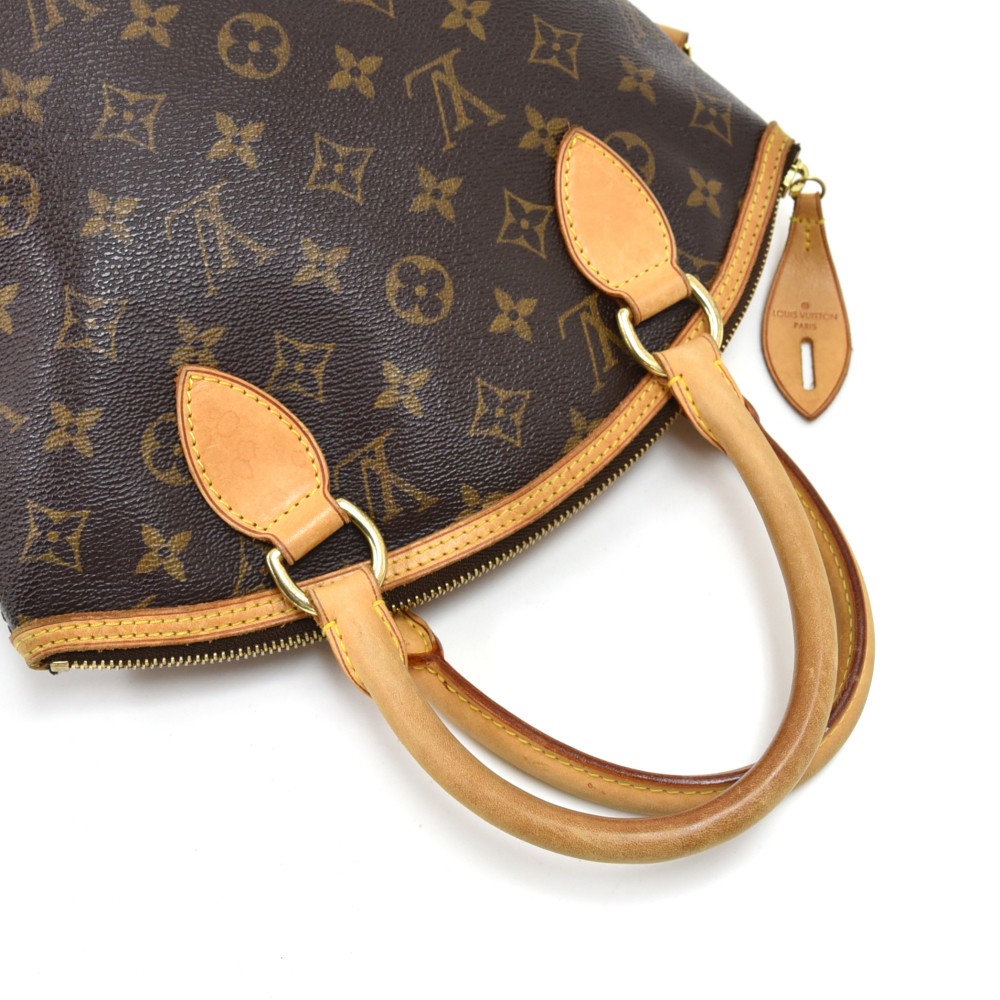 Louis Vuitton, a 'Lockit' monogram canvas handbag, 2012. - Bukowskis