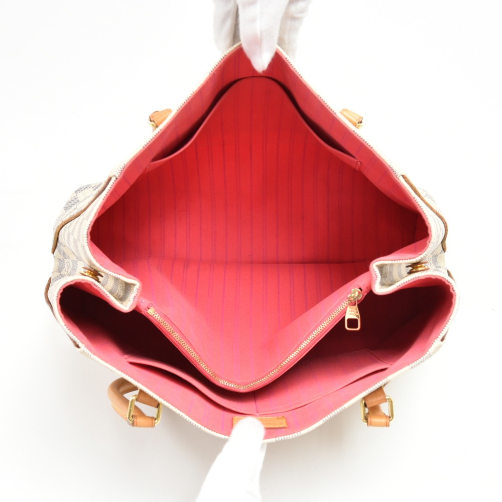 At Auction: Louis Vuitton, LOUIS VUITTON CALVI RED COATED CANVAS CROSSBODY