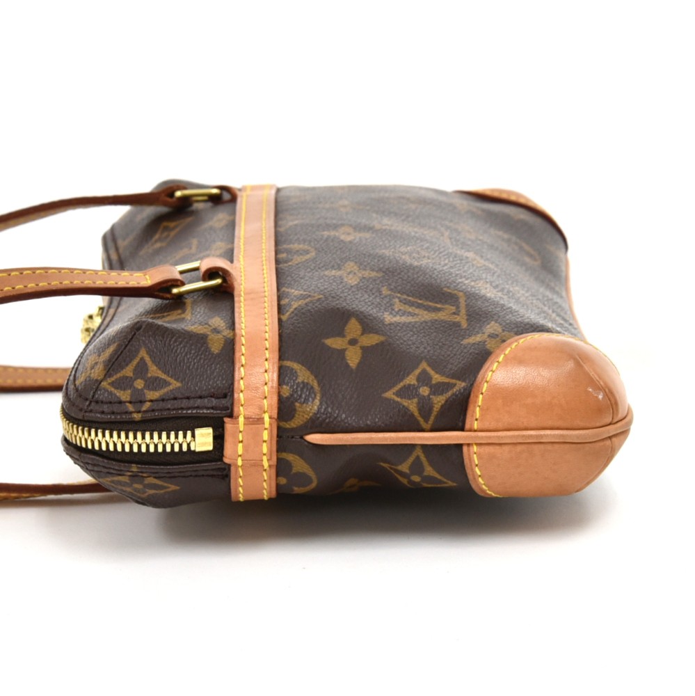 Sold at Auction: Louis Vuitton Brown Monogram Coated Canvas Mini Coussin  Shoulder Bag, the double vachetta leather straps with brass hardware,  openin
