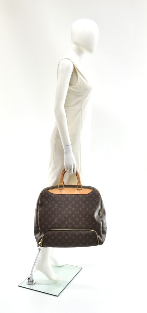 Louis Vuitton Vintage Monogram Canvas Evasion Travel Bag For Sale at  1stDibs  vintage louis vuitton travel bag, louis vuitton evasion bag,  louis vuitton evasion travel bag