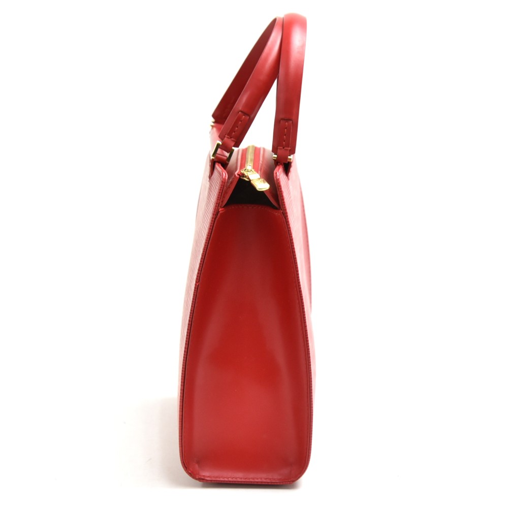 Louis Vuitton Ségur handbag in red epi leather