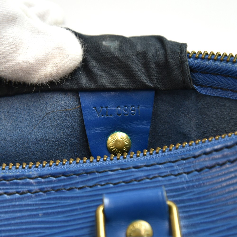 Speedy leather handbag Louis Vuitton Blue in Cloth - 36383352