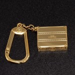Louis Vuitton Gold Tone Trunk Motif Key Chain / Holder