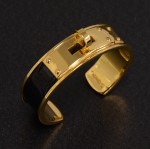 Hermes Kelly Black x Gold Tone Bangle