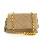 Vintage Chanel Beige Quilted Leather Fringe Shoulder Mini Bag