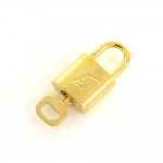 Louis Vuitton Gold Tone Padlock + Key