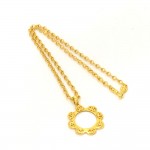 Chanel CC Gold Tone Flower Magnifying Glass Motif Pendant Necklace