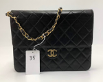35 Chanel 8.5" Classic Black Quilted Leather Shoulder Flap Bag