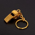 Chanel Gold Tone Whistle Shaped Key Ring